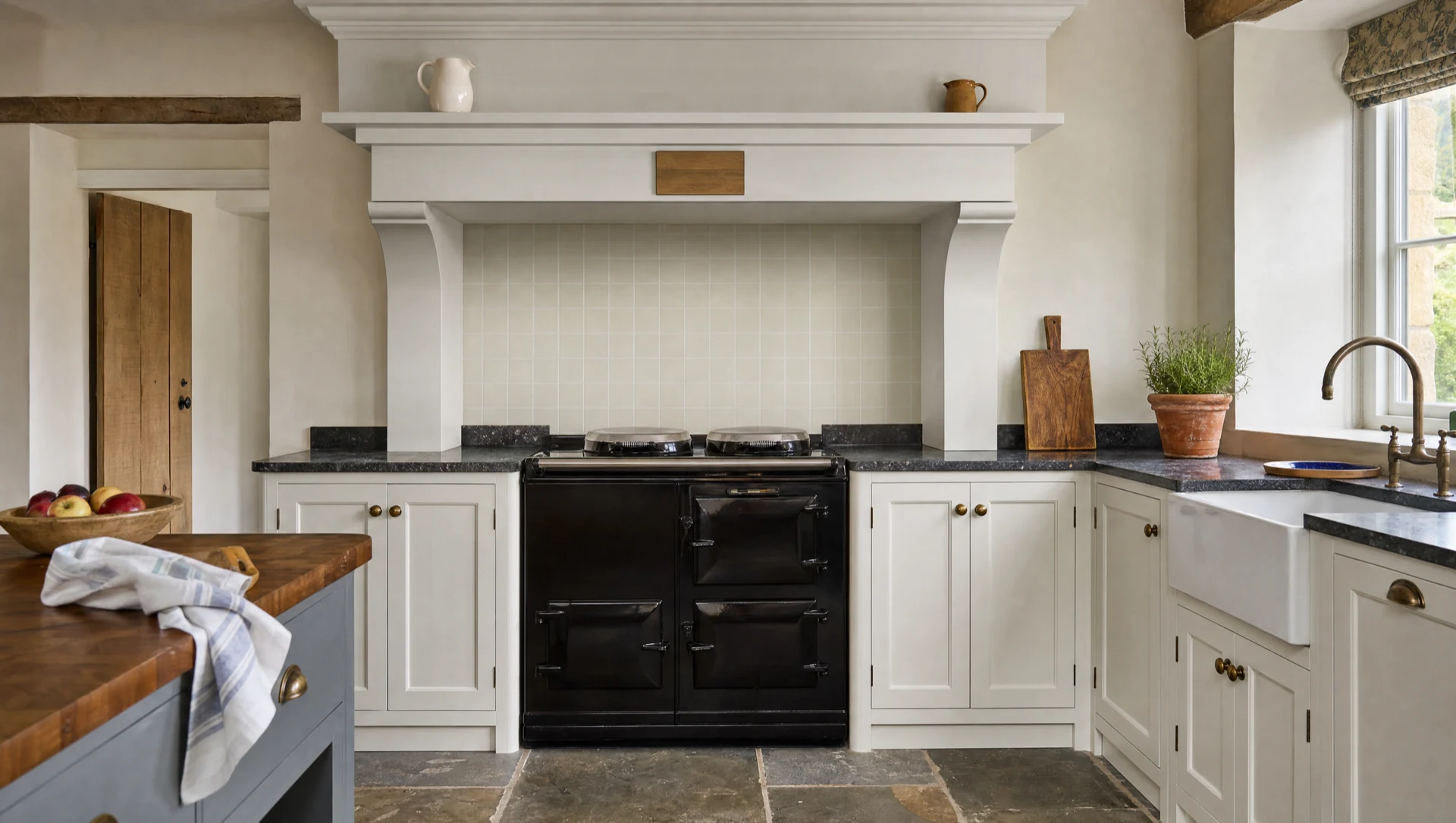 A painted mantel over the range with a fireclay sink, The Farmhouse