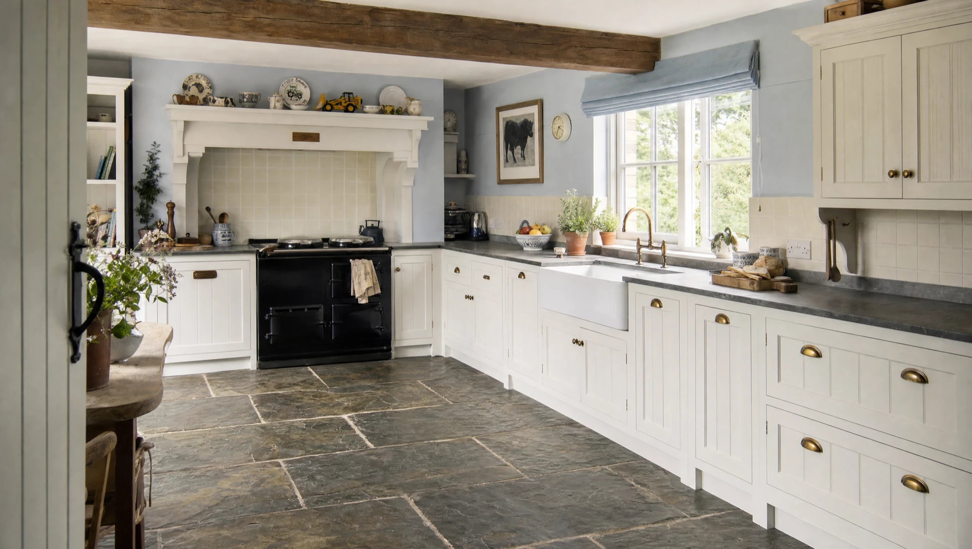 A painted in-frame English kitchen built around the range and the sink, installed and finished