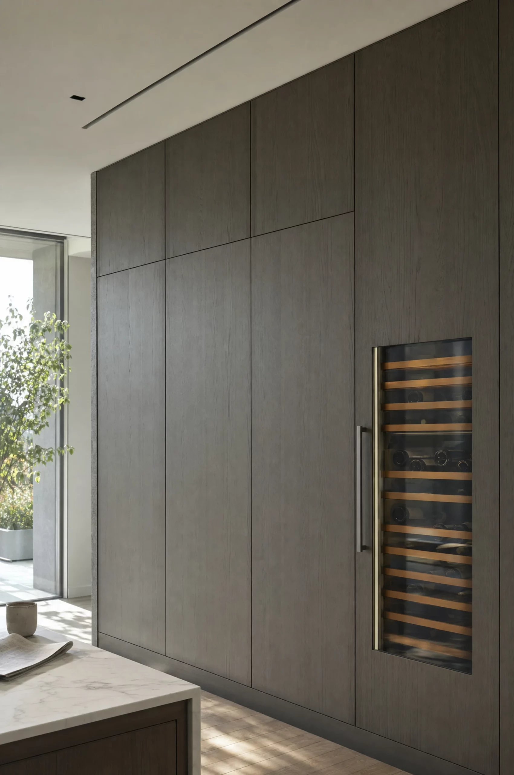 Full-height cabinetry built around appliance columns.